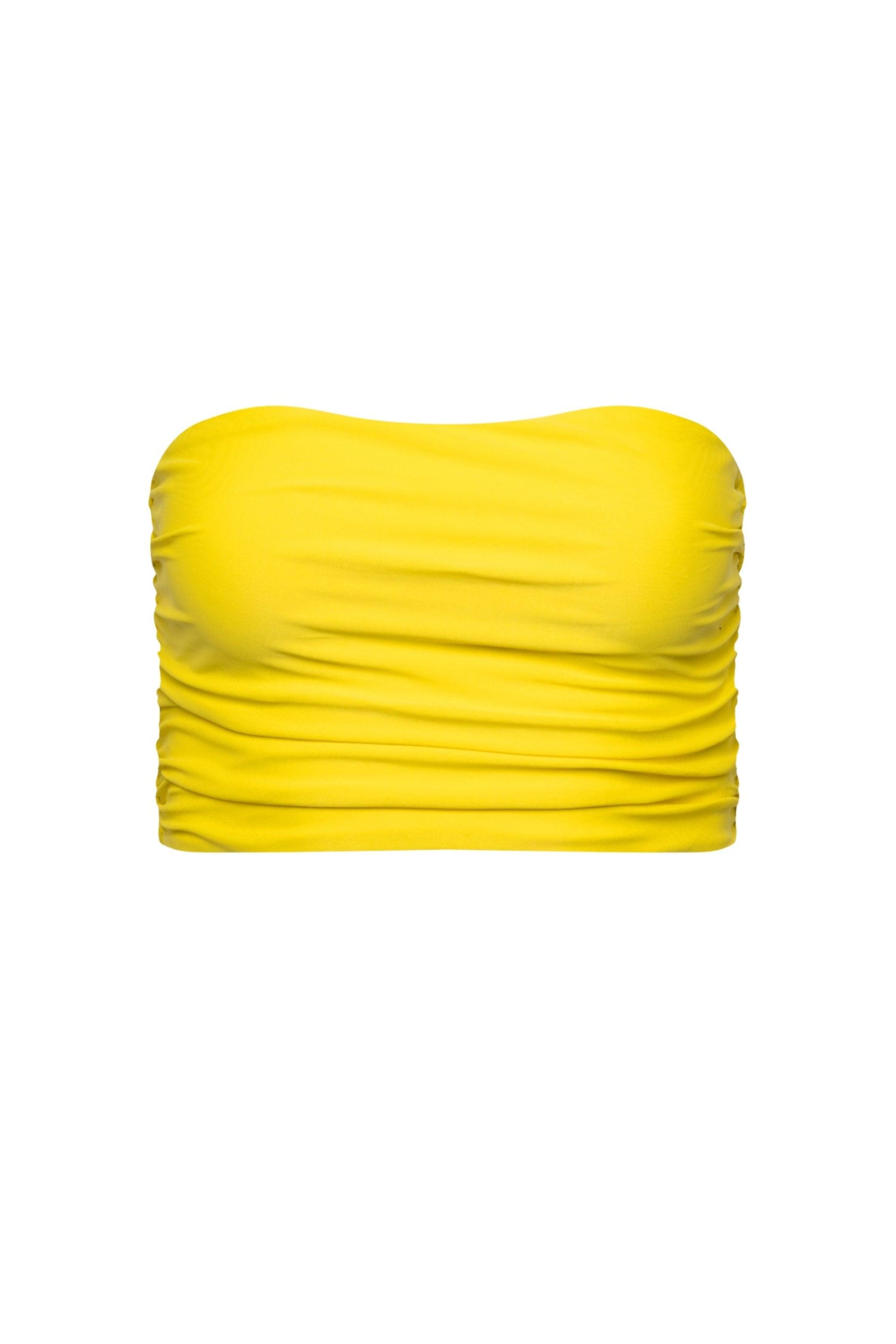 A strapless yellow longline tankini top with fabric ruching and side seam boning.